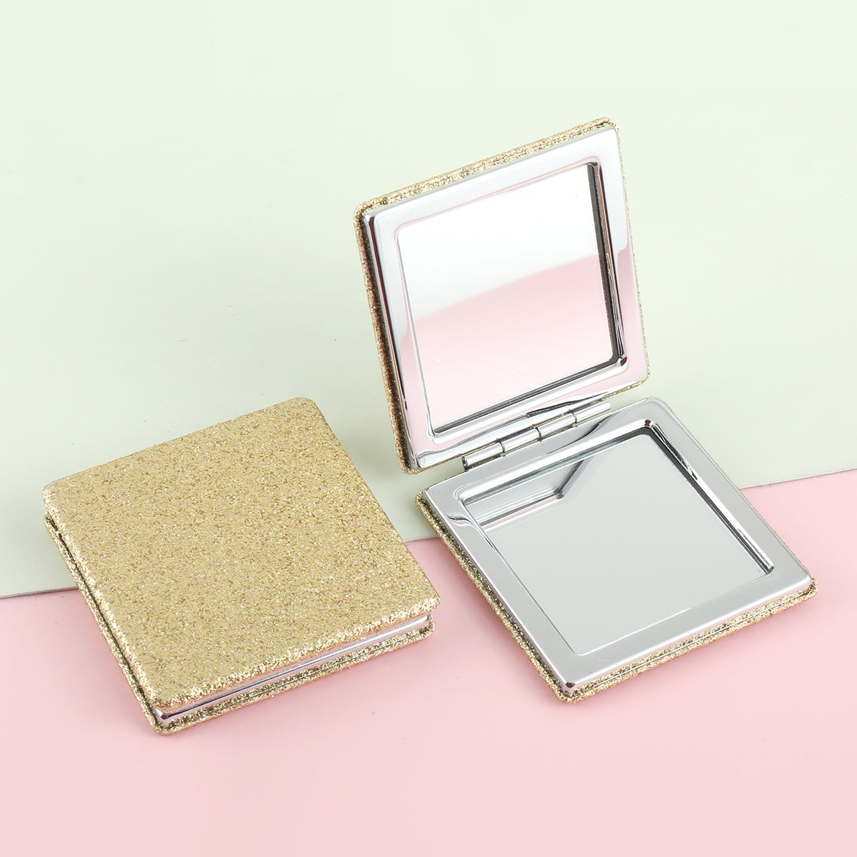 The silver plated square loose powder mirror has a size of 70*70 mm. One side is normal and the other side is doubled in magnification. It is available in gold, pink, rose red, and black. You can customize your own pattern and logo.