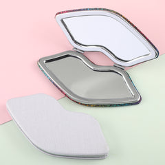 The silver plated limp-shaped loose powder mirror has a size of 120 mm. One side is normal and the other side is doubled in magnification. It is available in brown, silver and pink. You can also customize your favorite patterns and logos.