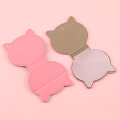 A 75* 80mm silver plated stainless steel cosmetic mirror, one side is normal and the other side is doubled in magnification. Available in khaki, black, and pink. You can also customize your own pattern and logo