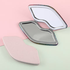 The silver plated limp-shaped loose powder mirror has a size of 120 mm. One side is normal and the other side is doubled in magnification. It is available in brown, silver and pink. You can also customize your favorite patterns and logos.