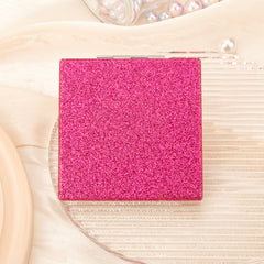 The silver plated square loose powder mirror has a size of 70*70 mm. One side is normal and the other side is doubled in magnification. It is available in gold, pink, rose red, and black. You can customize your own pattern and logo.