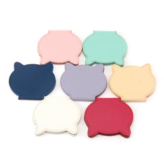 PU Eco-Friendly Leather Single-Sided Stainless Steel Makeup Mirror,HD Mirror, Cat Head Shape Design, Lightweight and Portable. Compact Size of 80*76*8 mm and Ten Colors Make Your Beauty Space More Personalized