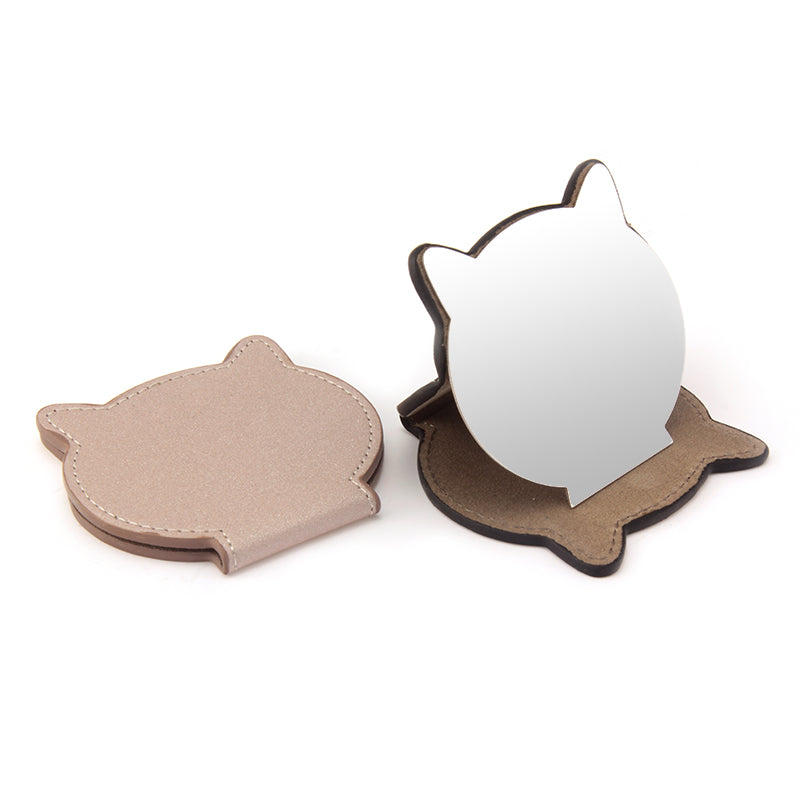 PU Eco-Friendly Leather Single-Sided Stainless Steel Makeup Mirror,HD Mirror, Cat Head Shape Design, Lightweight and Portable. Compact Size of 80*76*8 mm and Ten Colors Make Your Beauty Space More Personalized