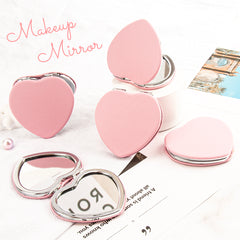 ✨ Unleash the Glam: 65mm Heart-Shaped Double-Sided Makeup Mirror! Silver Plating, Dreamy Pink PU Leather Wrap, 2x Magnification on One Side, Crystal Clear Glass, In Stock for Instant Glamification! 💖✨