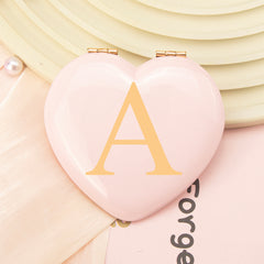 Rose Gold-Plated Heart-Shaped Mirrors with Printed Letters. Exquisite packaging, in stock, and available for mixed batches. Perfect for wholesale, international trade, and beauty industry clients. Elevate your inventory now!