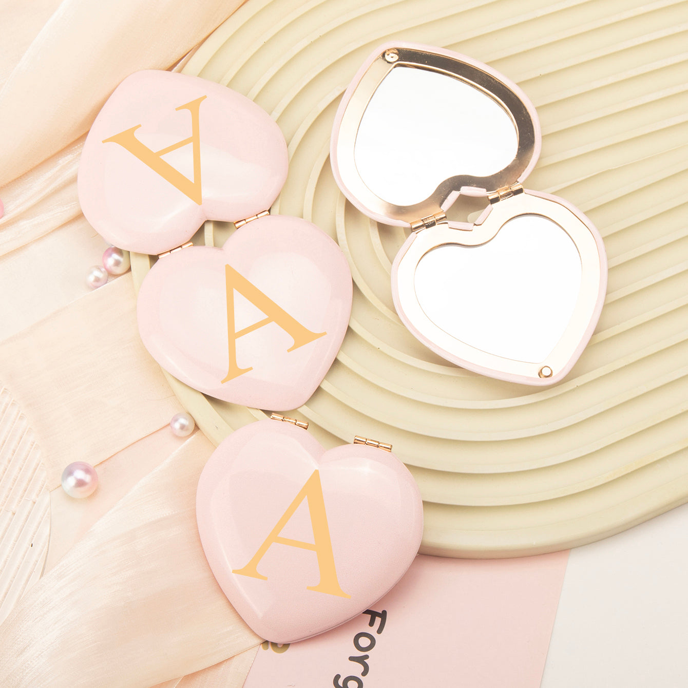 Rose Gold-Plated Heart-Shaped Mirrors with Printed Letters. Exquisite packaging, in stock, and available for mixed batches. Perfect for wholesale, international trade, and beauty industry clients. Elevate your inventory now!