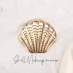 DIY Delight! In-stock Blank Seashell-shaped Makeup Mirror, 70mmX80mm, available in Rose Gold and Silver. Unleash your creativity and craft your own makeup masterpiece