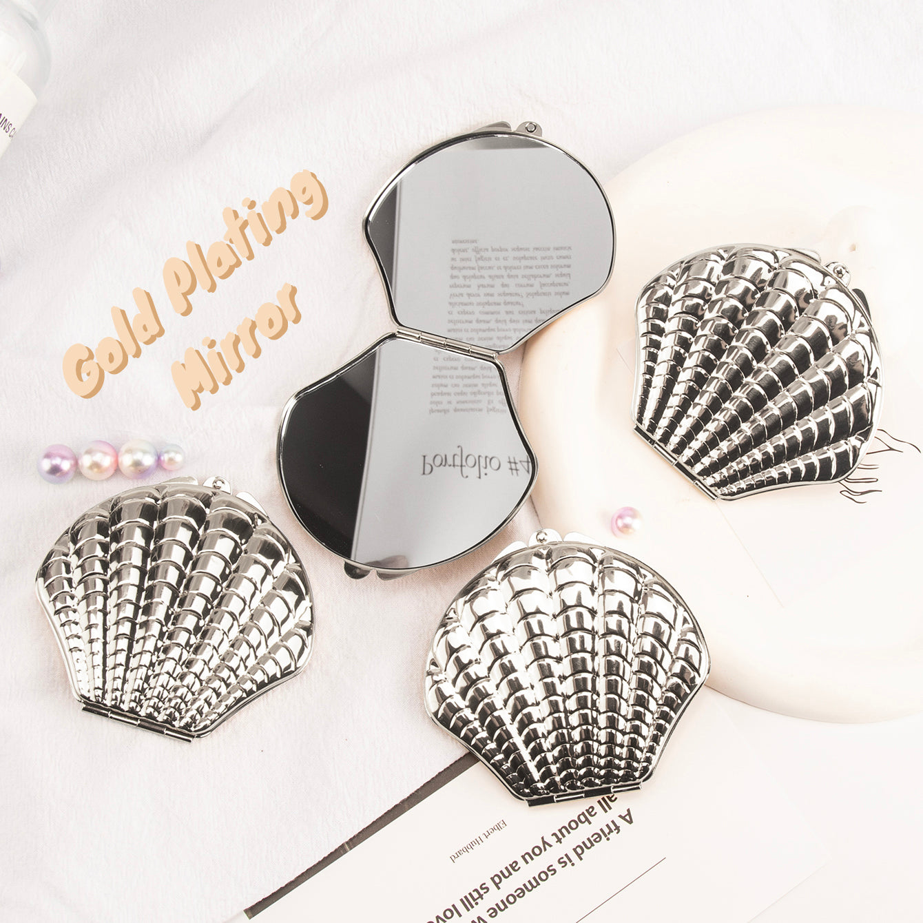 DIY Delight! In-stock Blank Seashell-shaped Makeup Mirror, 70mmX80mm, available in Rose Gold and Silver. Unleash your creativity and craft your own makeup masterpiece