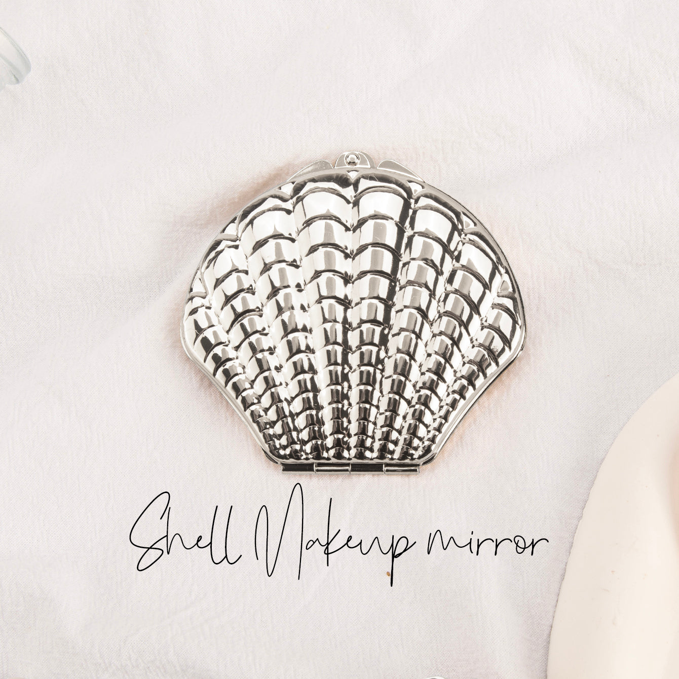 DIY Delight! In-stock Blank Seashell-shaped Makeup Mirror, 70mmX80mm, available in Rose Gold and Silver. Unleash your creativity and craft your own makeup masterpiece