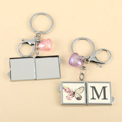 1PC Square Keychain Makeup Mirror Double Side Compact Mirror 2X Magnification The Glue Drop Letter Pattern Is Small And Easy To Carry Suitable As A Gift For Mother Sister And Daughter It Is Easy To Carry And Use At Home Or On The Go