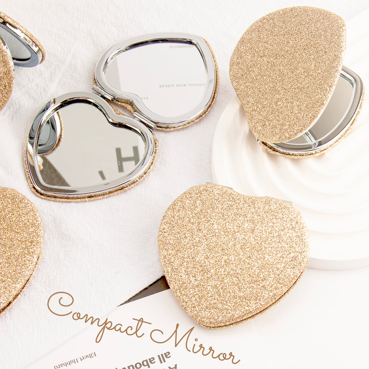 Radiant Heartbeat ✨ 65mm Silver Electroplated Makeup Mirror with Heart-shaped Magnetic Closure, Glittery Grid PU Leather Wrap, Ideal for Holiday Gifting! Available in Gold, Black, Pink, and Rose Red