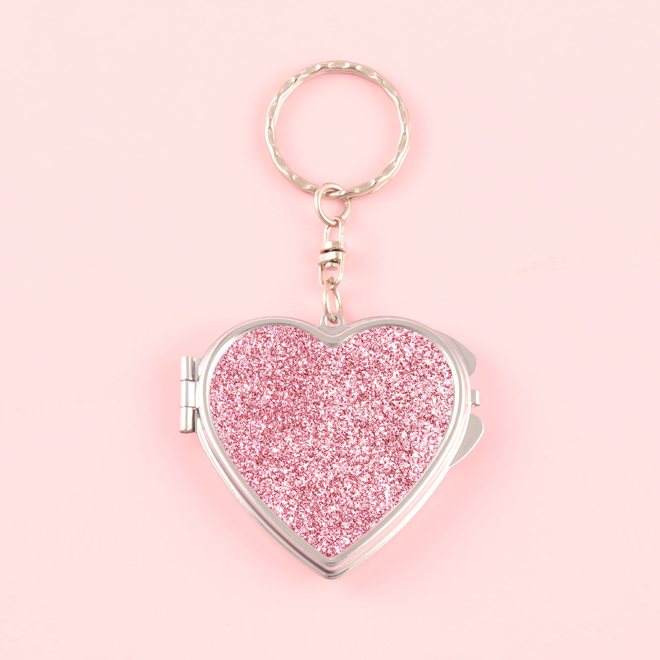 ✨Chic Heart Keychain Mirror: Dual-sided glass, silver electroplating, compact 50mm size. PU glitter leather surface in Black, Gold, Blue, Silver, Pink, Red. Elevate your on-the-go makeup with style!💄🔑