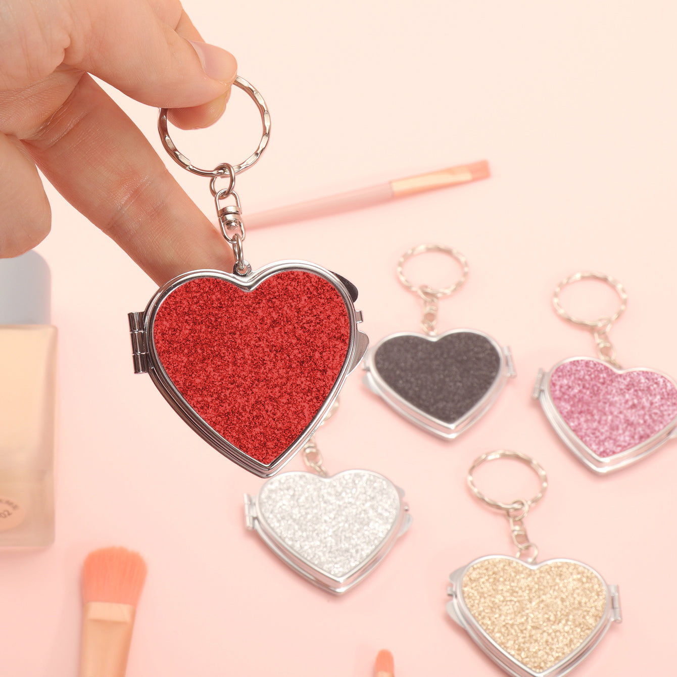 ✨Chic Heart Keychain Mirror: Dual-sided glass, silver electroplating, compact 50mm size. PU glitter leather surface in Black, Gold, Blue, Silver, Pink, Red. Elevate your on-the-go makeup with style!💄🔑