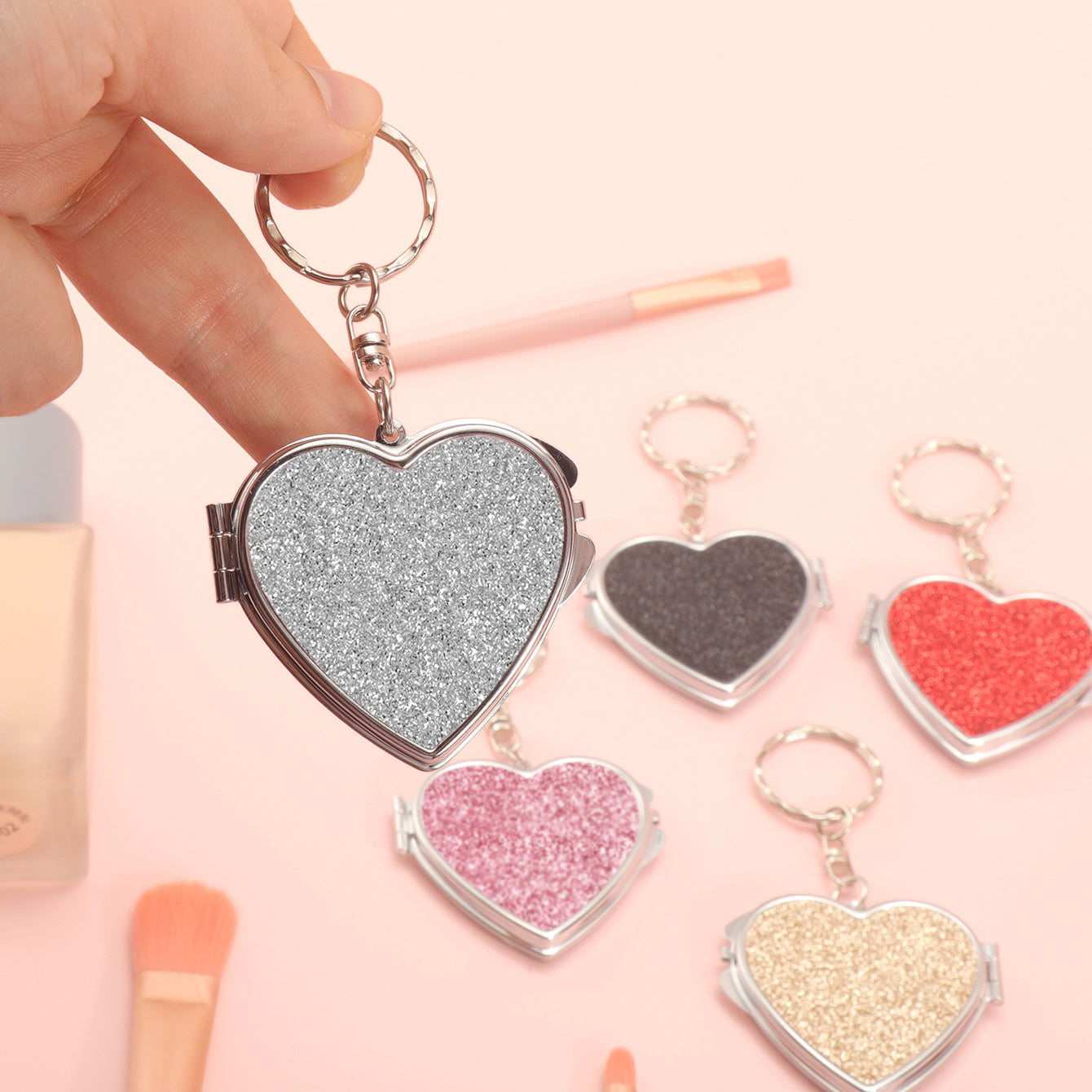 ✨Chic Heart Keychain Mirror: Dual-sided glass, silver electroplating, compact 50mm size. PU glitter leather surface in Black, Gold, Blue, Silver, Pink, Red. Elevate your on-the-go makeup with style!💄🔑