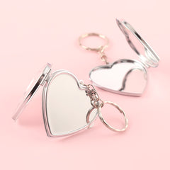 DIY Heart-shaped Keychain Makeup Mirror with Dual Glass Panels, Silver Electroplating, Metallic Charm, Compact 50mm Size. Elevate your beauty game with this on-the-go essential! 💄🔑