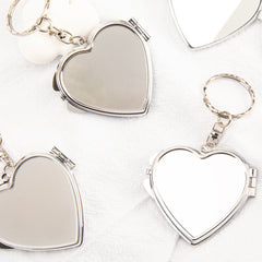 DIY Heart-shaped Keychain Makeup Mirror with Dual Glass Panels, Silver Electroplating, Metallic Charm, Compact 50mm Size. Elevate your beauty game with this on-the-go essential! 💄🔑