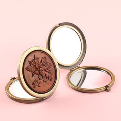 Pocket-sized Beauty Marvel ✨ 70mm Round Dual-sided Makeup Mirror – Antique Green Bronze Finish, Metal Frame, Solid Wood Carvings, Glass Lenses, 2X Magnification. Unveil Your Beauty in Style