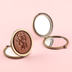 Pocket-sized Beauty Marvel ✨ 70mm Round Dual-sided Makeup Mirror – Antique Green Bronze Finish, Metal Frame, Solid Wood Carvings, Glass Lenses, 2X Magnification. Unveil Your Beauty in Style