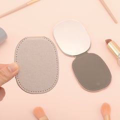 Fashion Forward | PU Leather Clad, Compact 8K HD Egg-shaped Folding Makeup Mirror, Four Colors to Choose from, Drop-Proof Design