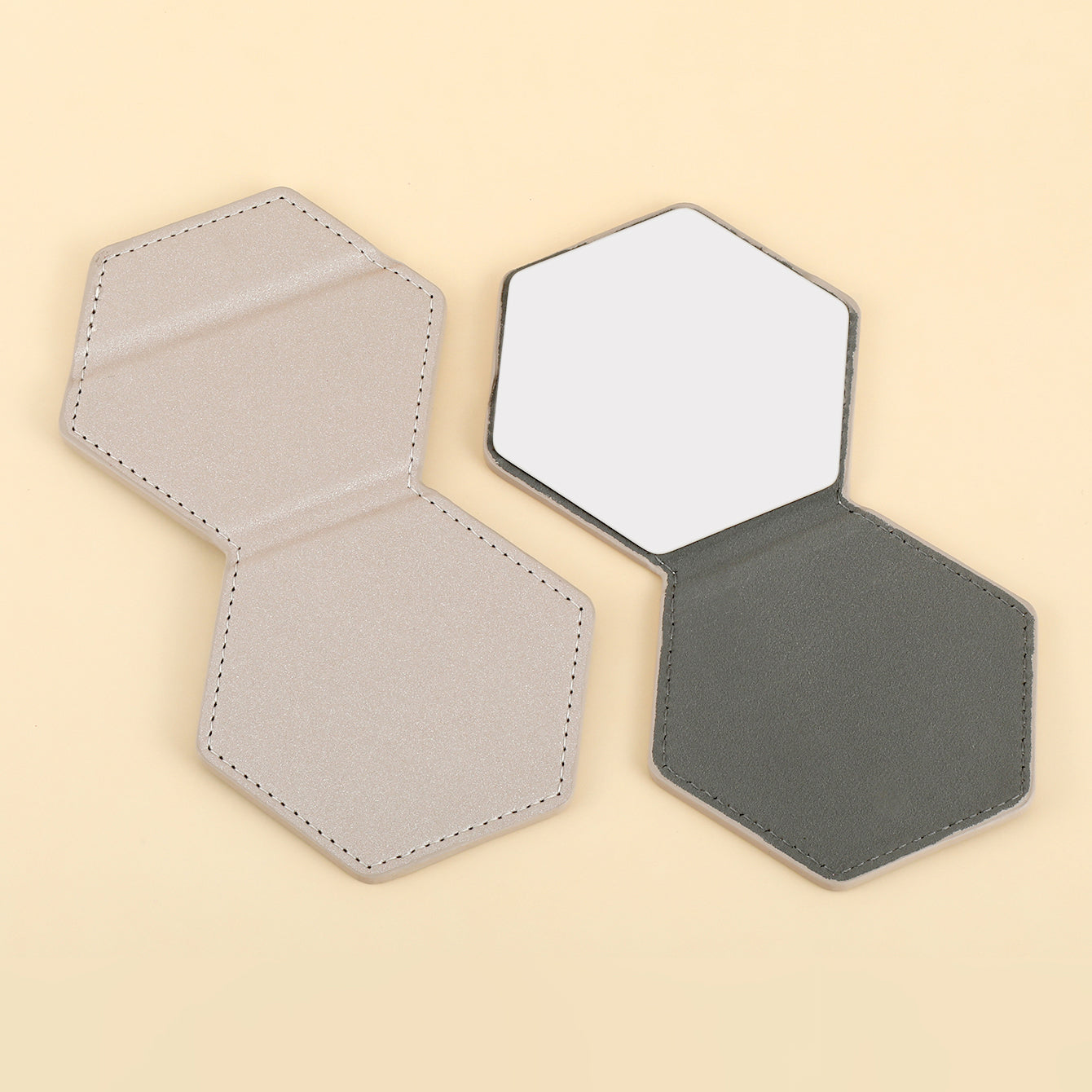 Chic and Compact at 80x90mm, Our Stainless Steel Folding Mirror, Encased in PU Leather, Is a Style Essential. In Khaki, Black, Pink, or White, It's Your On-the-Go Beauty Companion. Elevate Your Makeup Game Effortlessly! ✨