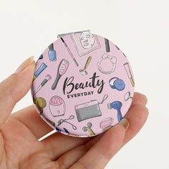 ✨ Elevate Your Beauty Game with Printed BEAUTY Text! 🌸 Compact & Chic at 70mm, our In-Stock Round Makeup Mirror is a Must-Have 💄 Double-sided for On-the-Go Glam, with 2x Magnification for Precision 🌈 Shiny Silver Electroplating Adds a Touch of Glam