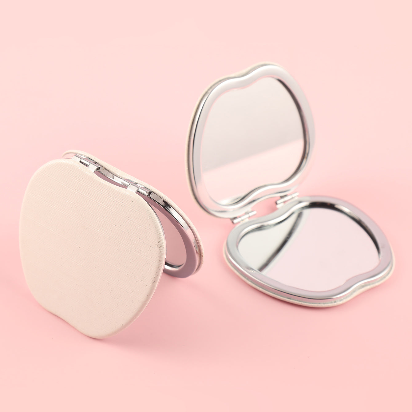 ✨Chic Foldable Elegance✨ 65*75mm Apple-shaped Makeup Mirror with Dual HD Glass, Silver Electroplating, Stylish White Stripe PU Leather Wrap – The perfect festive gift for friends! 💄🎁 #FashionBeauty #FestiveSurprise #ExquisiteGift