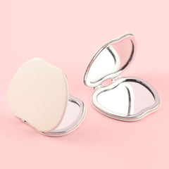 ✨Chic Foldable Elegance✨ 65*75mm Apple-shaped Makeup Mirror with Dual HD Glass, Silver Electroplating, Stylish White Stripe PU Leather Wrap – The perfect festive gift for friends! 💄🎁 #FashionBeauty #FestiveSurprise #ExquisiteGift