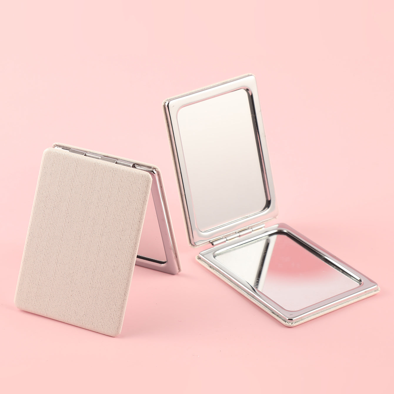 "Stylish White PU Leather-Wrapped Rectangular Mirror with Silver Electroplated Frame: Ideal Gift, Sized 85x62mm!"