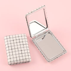 Chic 85*62mm Fabric Square Grid Makeup Mirror with Plating Silver Metal Frame, Available in White, Purple, and Khaki. Perfect for a refined look anytime, anywhere