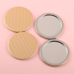 Beautiful Round Plating Silver Frame, Cross-Pattern PU Eco-Friendly Leather Embellishment, HD 60*60mm Makeup Mirror, Clearly Showing the Details of Makeup, The Perfect Choice for Both Fashion and Environmental Protection.