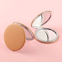 Yellow PU Leather, Paired with HD Glass Mirror and Plating Silver Metal Frames, Create a Light and Luxurious 70*70mm Round Cosmetic Mirror, with Exquisite Quality and Full Taste