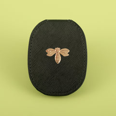 PU Eco-Friendly Leather with Bee Metal Decoration. Stainless Steel Cosmetic Mirror, 80*65mm Oval, Available in White, Pink, Light Pink, and Khaki.