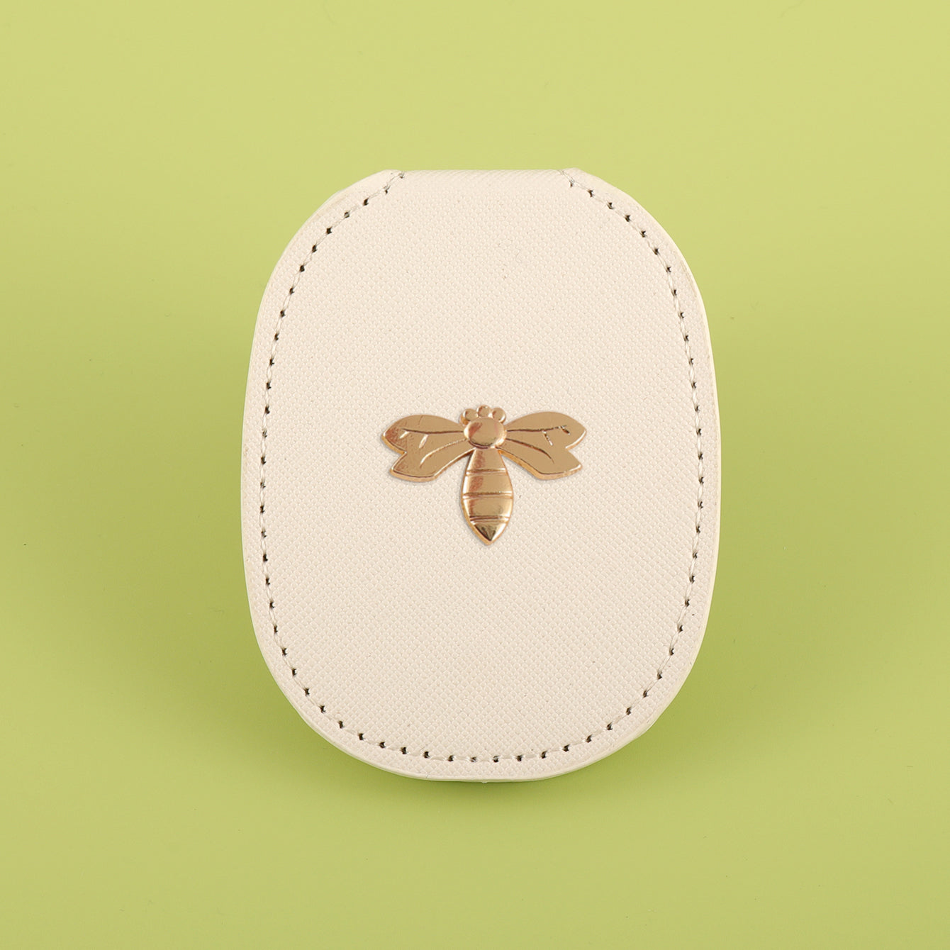 PU Eco-Friendly Leather with Bee Metal Decoration. Stainless Steel Cosmetic Mirror, 80*65mm Oval, Available in White, Pink, Light Pink, and Khaki.