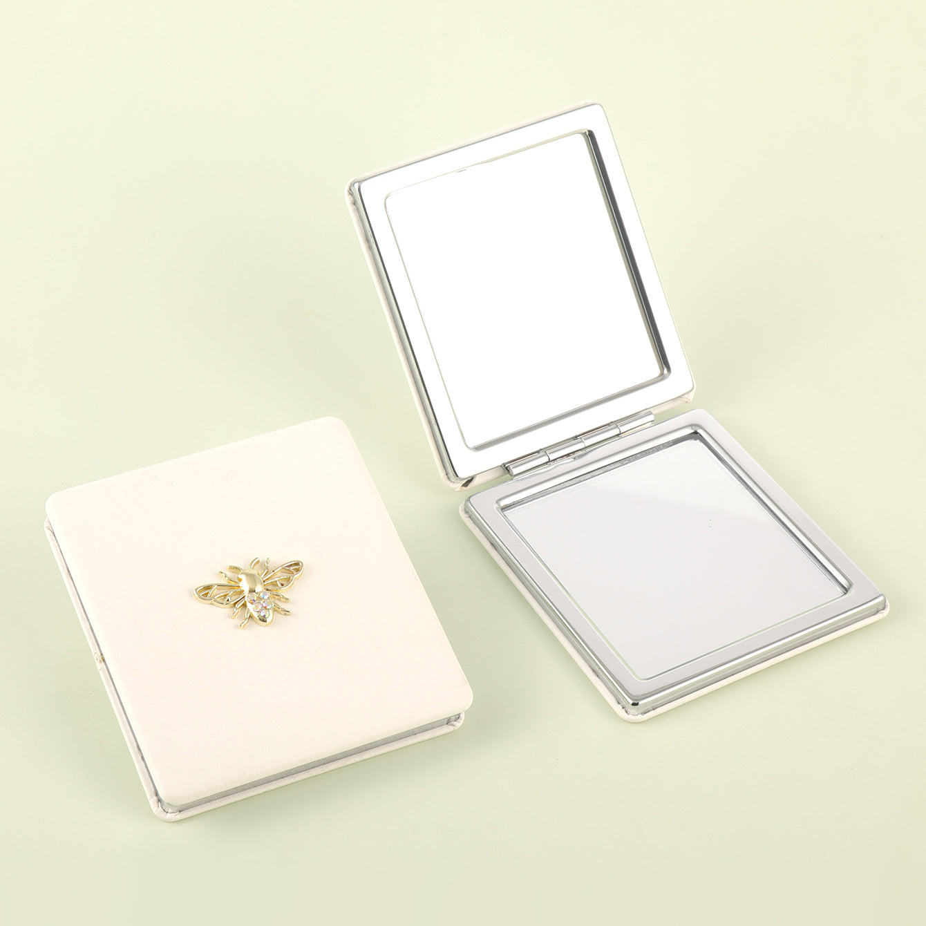 ✨ PU Eco-Friendly Leather Mirror, Embellished with Little Bee Gold Ornaments, HD Glass, Shiny Plating Silver Frame, 70*70mm Square Makeup Artifact, Pair It with Four Colors: Gold, Pink, White, and Black. 💄🌟