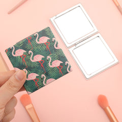 When Aesthetics Meets Practicality, We Create a 70*70mm Square Cosmetic Mirror Made of High-Grade PU Eco-Friendly Leather, Embellished with Flamingo Patterns, HD Glass, and a Silver Plating Metal Frame. It Is the Perfect Choice for Your Bestie!