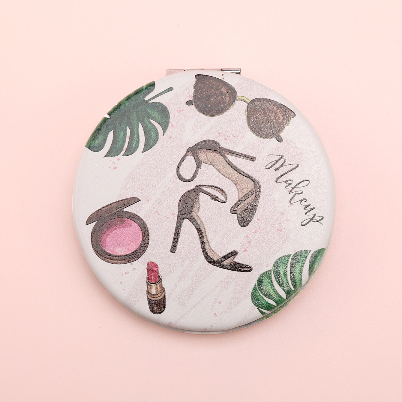 This 70*70mm Round PU Eco-Friendly Leather Makeup Mirror Comes With a Variety of Pattern Options and an Electroplated Silver Metal Frame, Making It a Perfect Gift Choice for Friends.