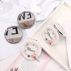 Eco-Friendly Leather Custom Makeup Mirror, 70*70mm Exquisite Round Design, Colorful Printing, Plating Silver Rim, and HD Mirror Provide an Excellent Makeup Experience