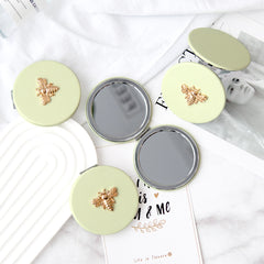 PU Eco-Friendly Leather With Metal Bee Decoration, Plating Silver Frame, And HD Glass Create A Fashionable Round Cosmetic Mirror With A Diameter Of 70mm, Making Your Makeup More Refined And Charming